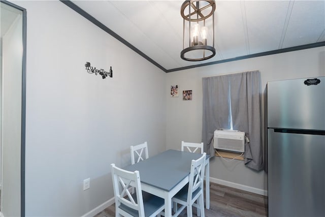 7848 Cold Springs Rd, Urbana, NY 14810 - dining area featuring wood finished floors, baseboards, ornamental molding, and an AC wall unit