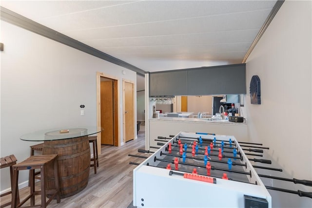 7848 Cold Springs Rd, Urbana, NY 14810 - playroom with ornamental molding and light wood-type flooring