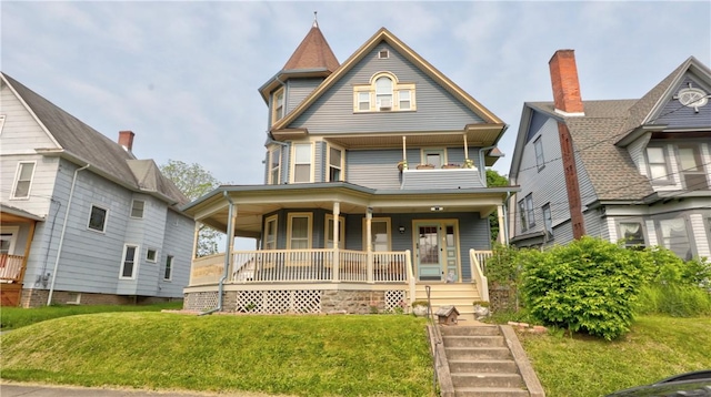 51 Sherrill St Unit 1, Geneva-City, NY 14456 - victorian-style house with a porch and a front lawn