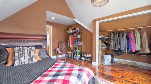 51 Sherrill St Unit 1, Geneva-City, NY 14456 - bedroom featuring vaulted ceiling and wood finished floors