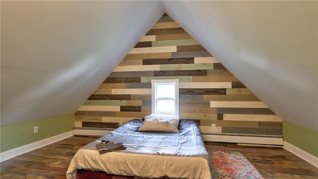 51 Sherrill St Unit 1, Geneva-City, NY 14456 - bedroom with a baseboard radiator, wooden walls, lofted ceiling, wood finished floors, and baseboards
