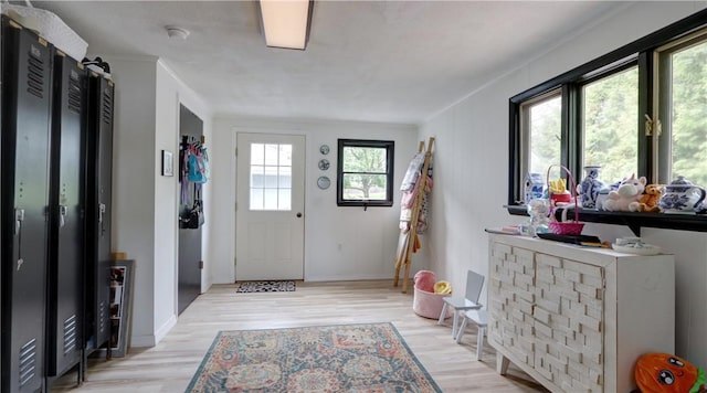 51 Sherrill St Unit 1, Geneva-City, NY 14456 - foyer with light wood-style floors and baseboards