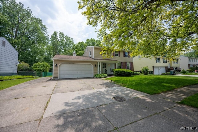 897 Fairmont Ave, North Tonawanda, NY 14120 - traditional-style house with an attached garage and concrete driveway