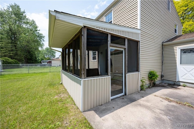 897 Fairmont Ave, North Tonawanda, NY 14120 - view of home's exterior featuring a sunroom and a patio area