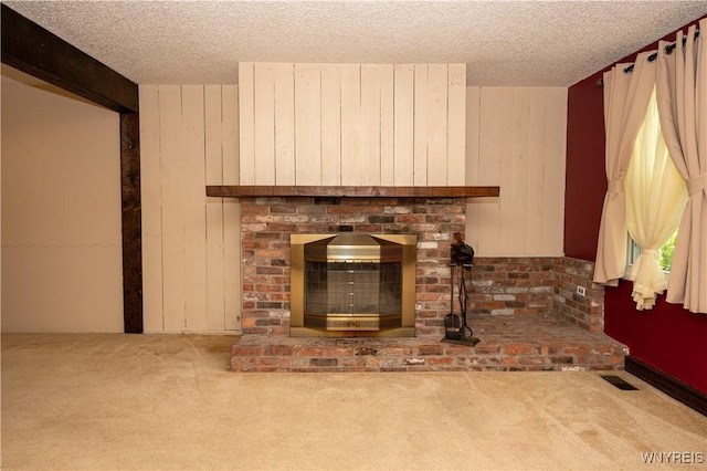 897 Fairmont Ave, North Tonawanda, NY 14120 - detailed view of carpet flooring, wooden walls, a textured ceiling, and a fireplace