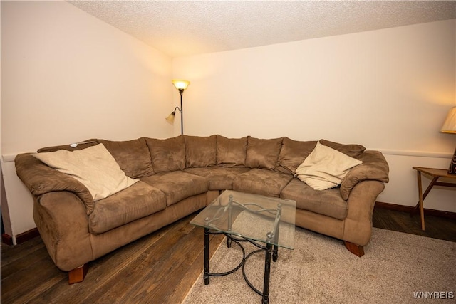 897 Fairmont Ave, North Tonawanda, NY 14120 - living area featuring a textured ceiling and wood finished floors