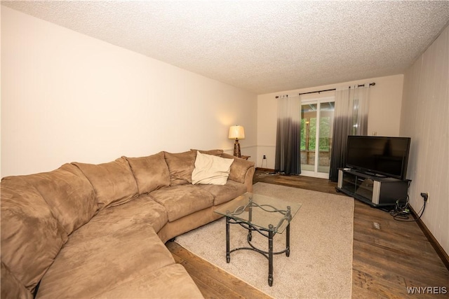 897 Fairmont Ave, North Tonawanda, NY 14120 - living area with a textured ceiling and dark wood-style floors