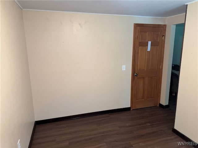 897 Fairmont Ave, North Tonawanda, NY 14120 - unfurnished room with dark wood-type flooring and crown molding