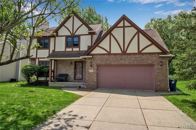 25 5th Ave, Amherst, NY 14221 - tudor house with stucco siding, a front yard, brick siding, and driveway