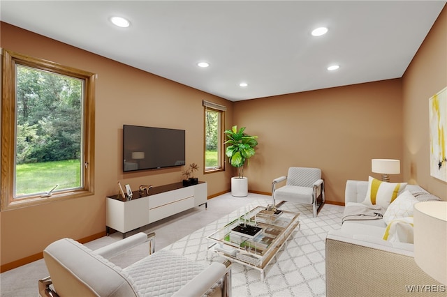 25 5th Ave, Amherst, NY 14221 - living area featuring baseboards, healthy amount of natural light, recessed lighting, and light carpet