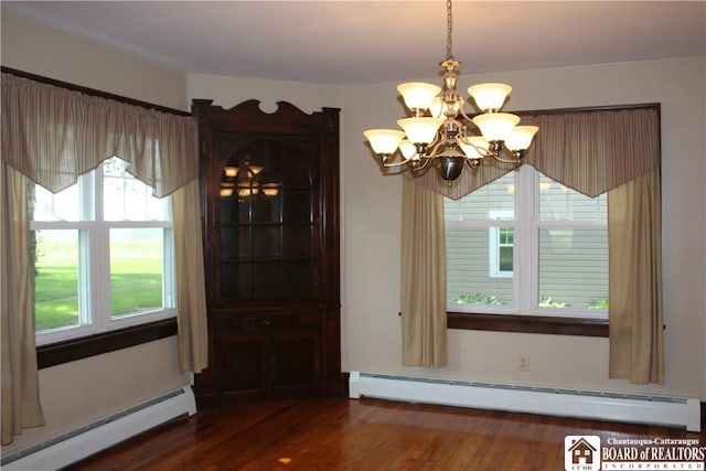 3582 Rte 20, Sheridan, NY 14063 - unfurnished dining area featuring baseboard heating, a chandelier, and dark wood-type flooring