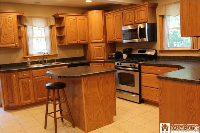 3582 Rte 20, Sheridan, NY 14063 - kitchen featuring appliances with stainless steel finishes, a sink, healthy amount of natural light, a center island, and recessed lighting