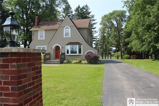 3582 Rte 20, Sheridan, NY 14063 - view of front of home with a chimney and a front lawn