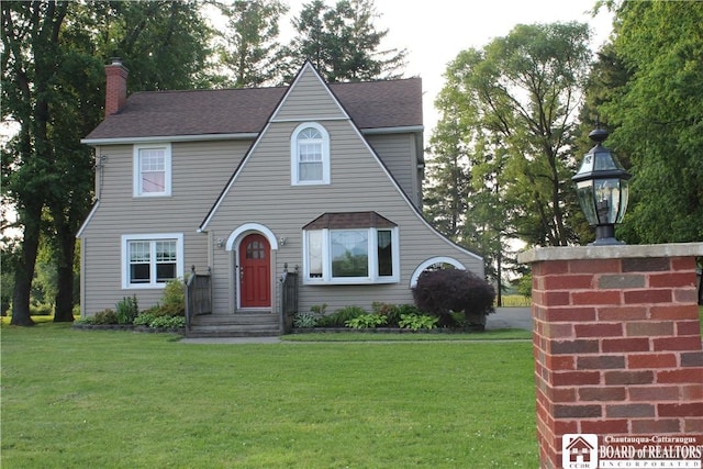 3582 Rte 20, Sheridan, NY 14063 - view of front of property featuring a chimney, a front lawn, and a shingled roof