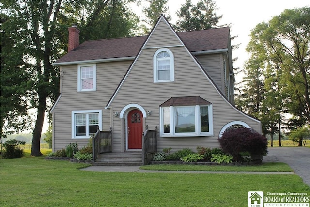 3582 Rte 20, Sheridan, NY 14063 - view of front of property with a chimney, a front yard, and a shingled roof