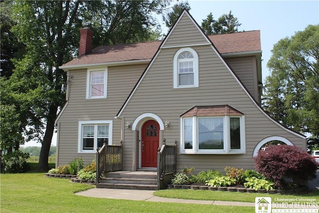 3582 Rte 20, Sheridan, NY 14063 - view of front of house featuring a front lawn, a chimney, and roof with shingles