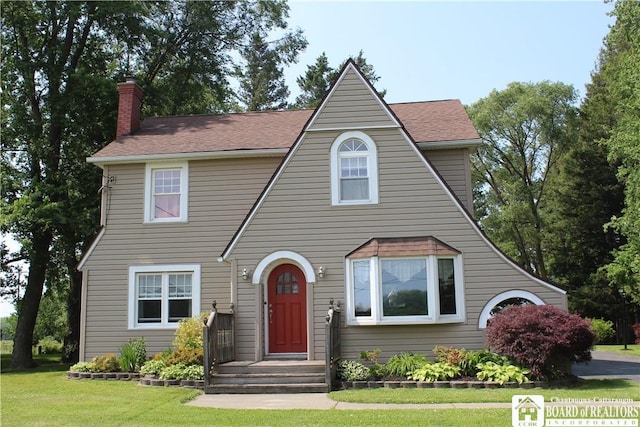 3582 Rte 20, Sheridan, NY 14063 - view of front of property featuring a chimney, a front yard, and a shingled roof