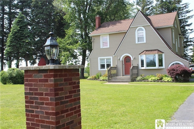 3582 Rte 20, Sheridan, NY 14063 - view of front of house featuring a front lawn, a chimney, and roof with shingles