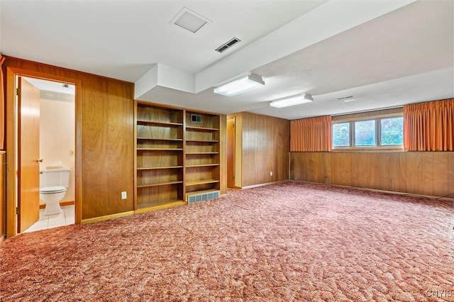 112 Elmcrest Cir, Salina, NY 13090 - carpeted empty room featuring wood walls