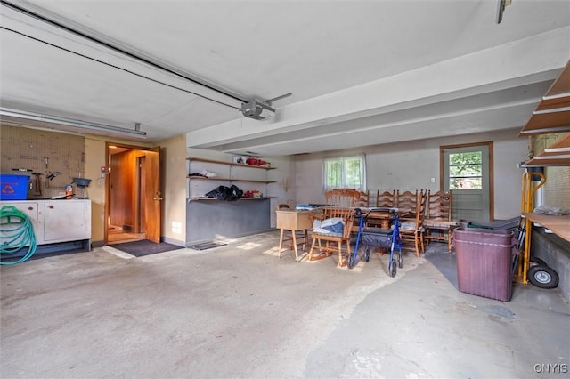 112 Elmcrest Cir, Salina, NY 13090 - garage featuring a garage door opener