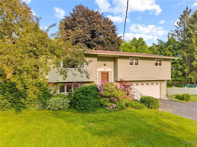 112 Elmcrest Cir, Salina, NY 13090 - split foyer home with driveway and an attached garage