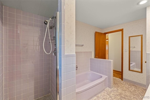 112 Elmcrest Cir, Salina, NY 13090 - full bathroom featuring a shower stall, a garden tub, wallpapered walls, and tile walls