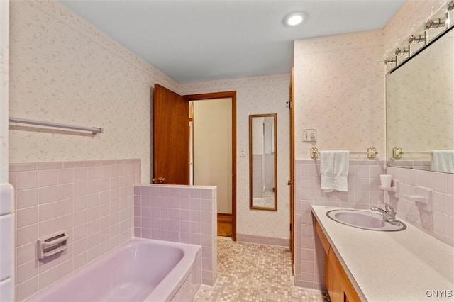 112 Elmcrest Cir, Salina, NY 13090 - full bath with wallpapered walls, a bath, vanity, wainscoting, and tile patterned floors