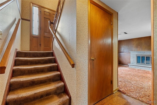 112 Elmcrest Cir, Salina, NY 13090 - stairway featuring a brick fireplace