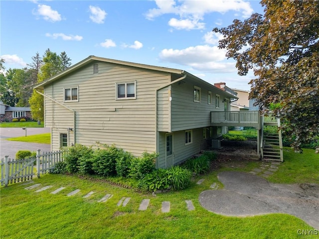112 Elmcrest Cir, Salina, NY 13090 - view of property exterior featuring stairs, a wooden deck, and central AC unit