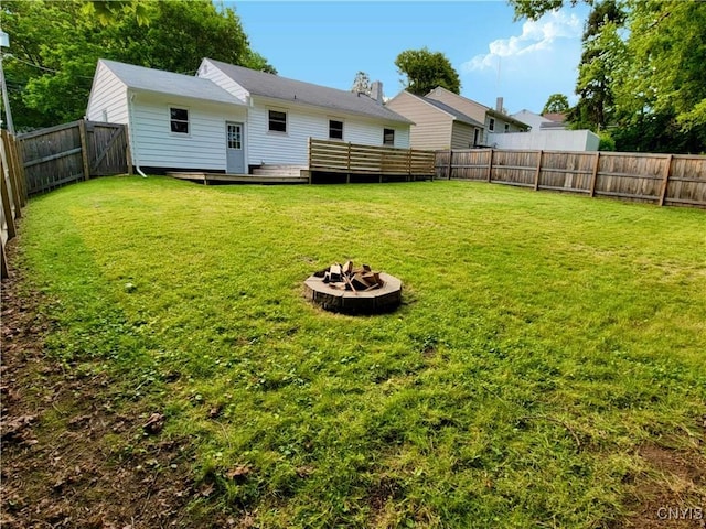 706 Dawes Ave, Utica, NY 13502 - view of yard with an outdoor fire pit and a deck
