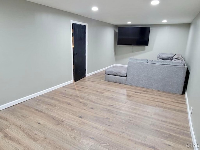 706 Dawes Ave, Utica, NY 13502 - living room featuring wood finished floors, recessed lighting, and baseboards