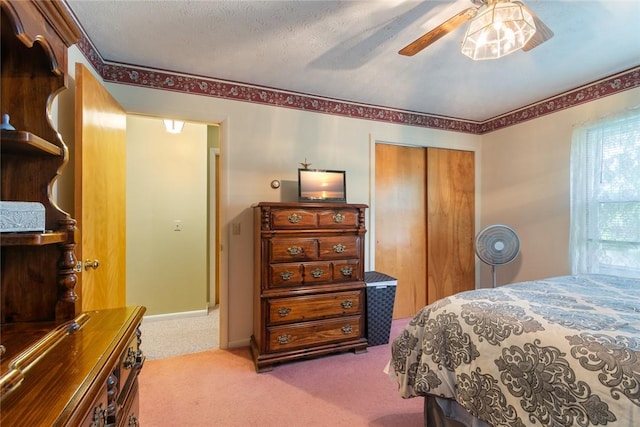 141 W Pearl St, Arcadia, NY 14513 - carpeted bedroom featuring a closet, a ceiling fan, and baseboards