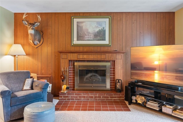 141 W Pearl St, Arcadia, NY 14513 - living room with wooden walls, a brick fireplace, and carpet floors