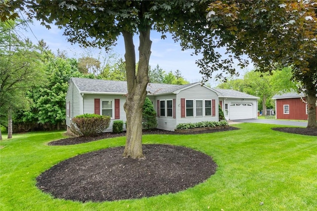 141 W Pearl St, Arcadia, NY 14513 - ranch-style house with an attached garage, asphalt driveway, a front lawn, and a shingled roof