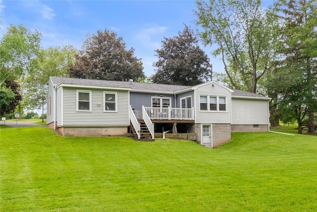141 W Pearl St, Arcadia, NY 14513 - rear view of house featuring a wooden deck, stairway, and a lawn