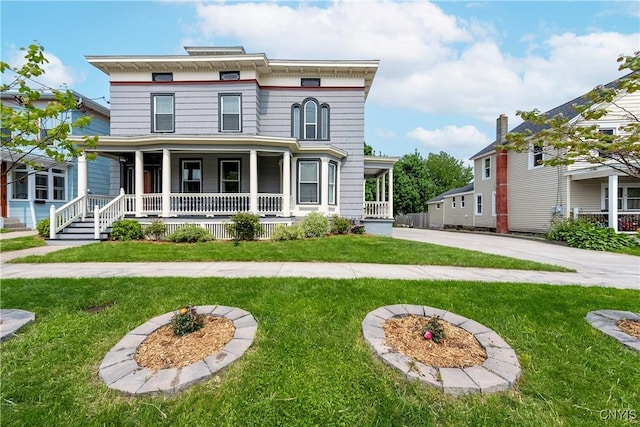 55 E 5th St, Oswego-City, NY 13126 - italianate house featuring a porch and a front lawn