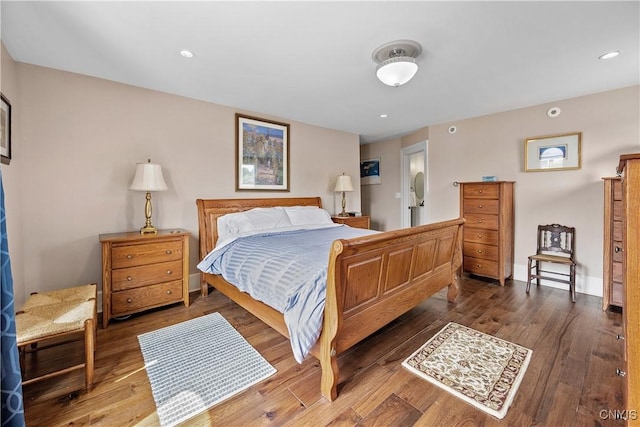55 E 5th St, Oswego-City, NY 13126 - bedroom featuring wood-type flooring, recessed lighting, and baseboards