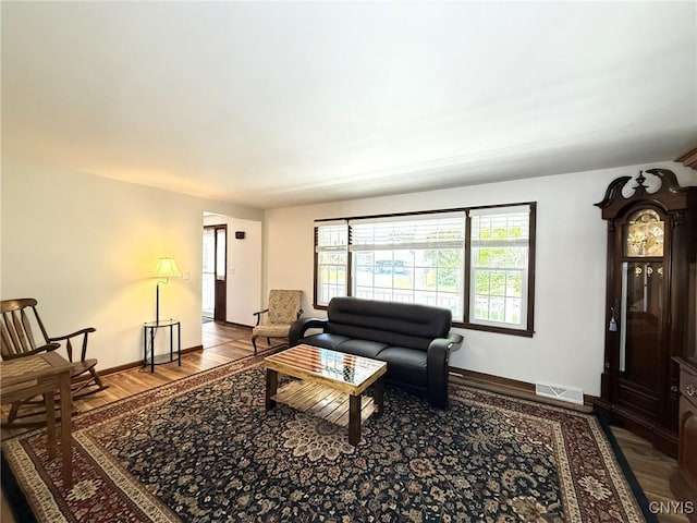4936 Look Kinney Cir, Clay, NY 13088 - living room with wood finished floors and baseboards