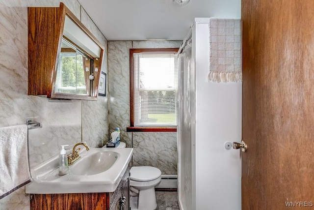 17 Porter Center Rd Unit N, Porter, NY 14174 - bathroom with vanity, toilet, and a baseboard heating unit