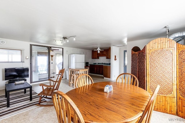 17 Porter Center Rd Unit N, Porter, NY 14174 - dining space featuring a ceiling fan and light carpet