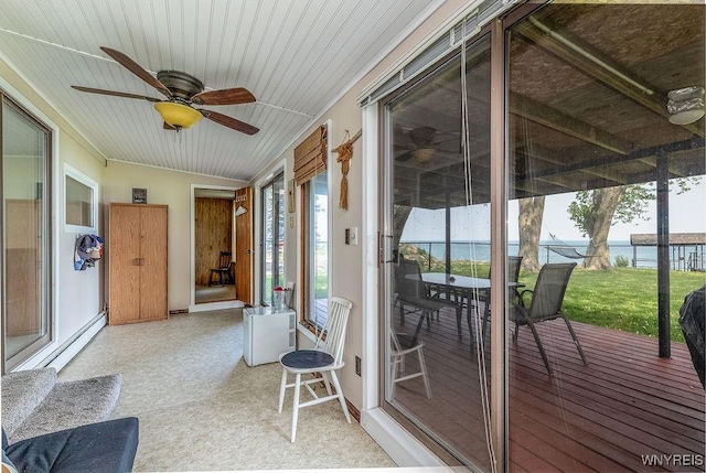 17 Porter Center Rd Unit N, Porter, NY 14174 - sunroom / solarium featuring healthy amount of natural light, baseboard heating, and a ceiling fan