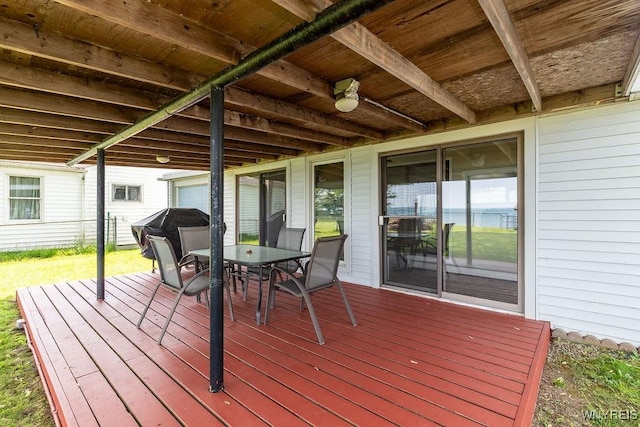17 Porter Center Rd Unit N, Porter, NY 14174 - wooden deck with outdoor dining space and area for grilling