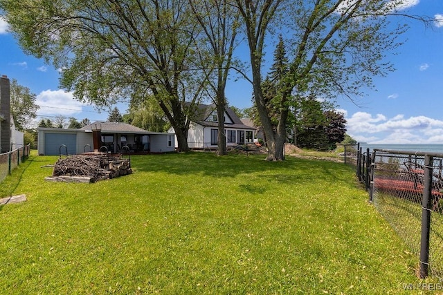 17 Porter Center Rd Unit N, Porter, NY 14174 - view of yard featuring an attached garage