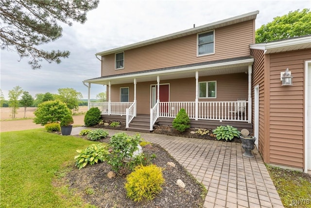 2220 W Genesee Tpke, Camillus, NY 13031 - view of front of property featuring covered porch and a front lawn