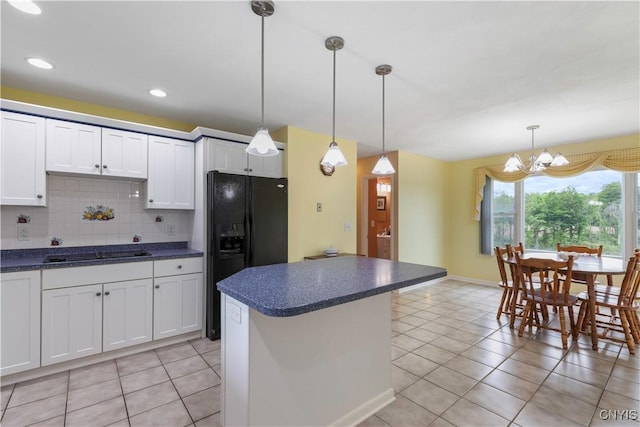 2220 W Genesee Tpke, Camillus, NY 13031 - kitchen featuring black appliances, dark countertops, light tile patterned flooring, white cabinetry, and recessed lighting