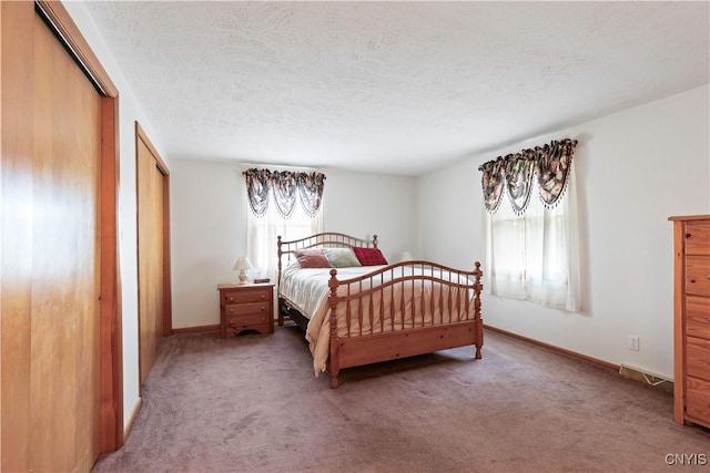 2220 W Genesee Tpke, Camillus, NY 13031 - carpeted bedroom featuring baseboards and a textured ceiling