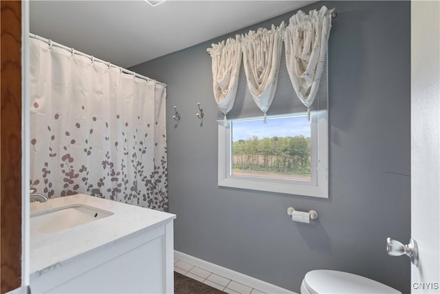 2220 W Genesee Tpke, Camillus, NY 13031 - full bathroom featuring vanity, toilet, tile patterned floors, baseboards, and curtained shower