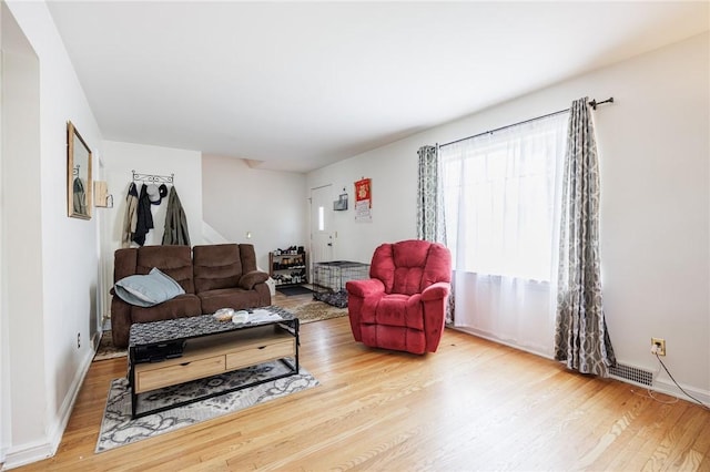 12 Queensboro Rd, Irondequoit, NY 14609 - living area featuring wood finished floors and baseboards