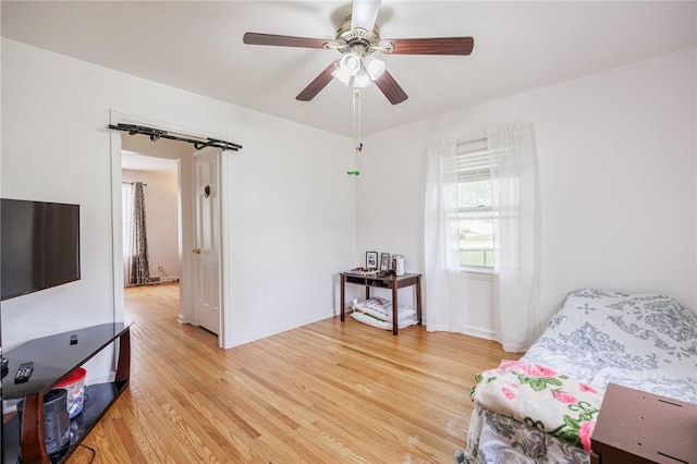 12 Queensboro Rd, Irondequoit, NY 14609 - sitting room featuring light wood-style floors, ceiling fan, and baseboards