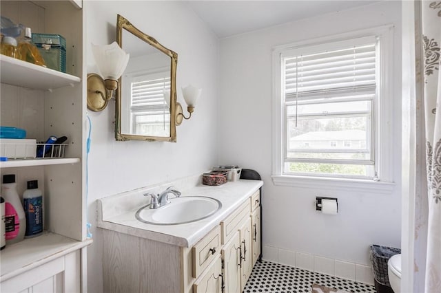 12 Queensboro Rd, Irondequoit, NY 14609 - bathroom with vanity, toilet, and baseboards